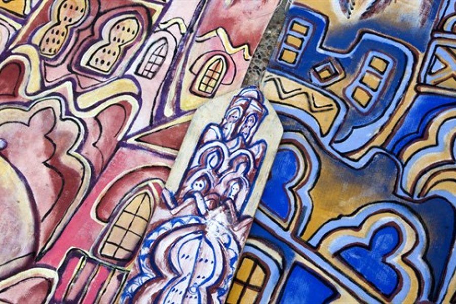 Cuadros de arte marroquí con motivos arquitectónicos y arabescos en tonos rosa y azul